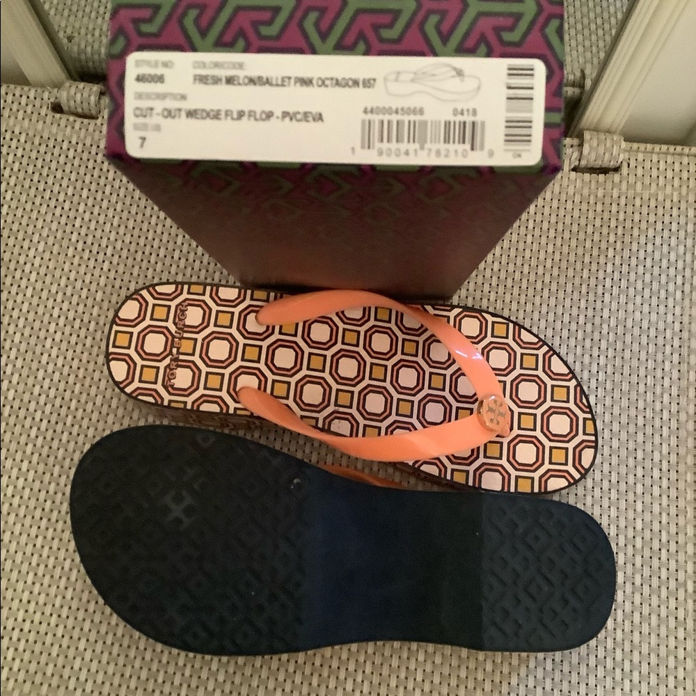 Slightly worn wedge flip flops